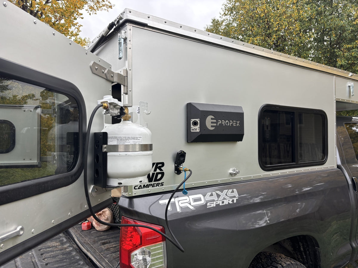 Propex HS2000 wall mount kit exterior cover on a truck topper